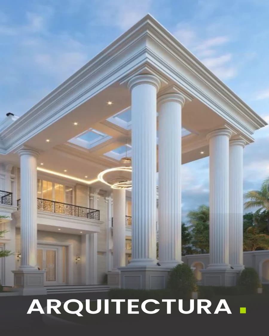 Pórtico de una vivienda señorial con columnas y cornisas blancas de gran altura.